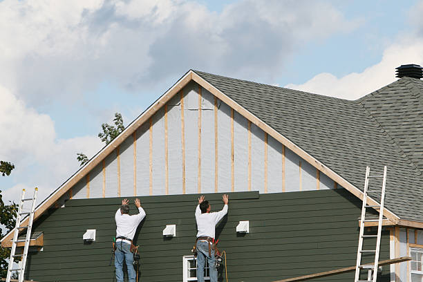 Professional Siding technician working in Troy, TX